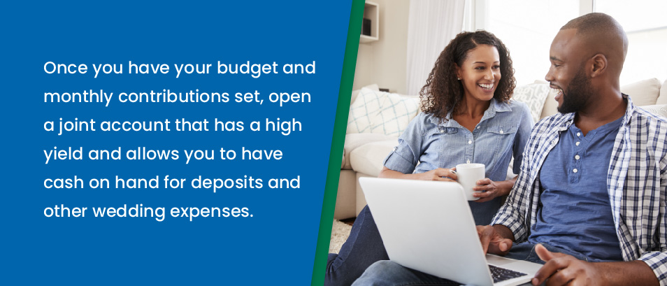 Once you have your budget and monthly contributions set, open a joint account that has a high yield and allows you to have cash on hand for deposits and other wedding expenses - image of a couple with a laptop opening a joint bank account